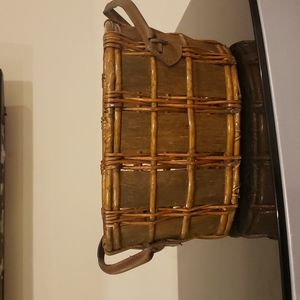 Wicker basket with leather handles